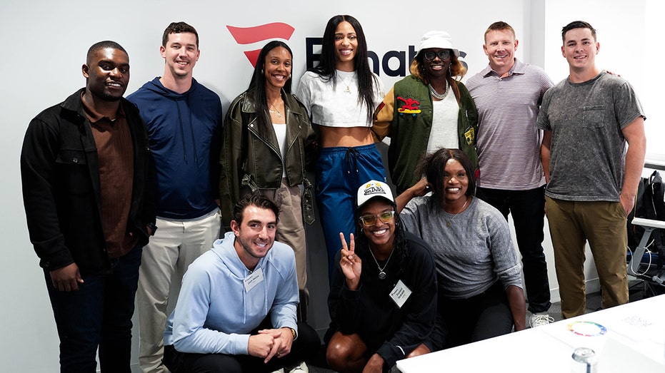 MLB and WNBA players pose for picture