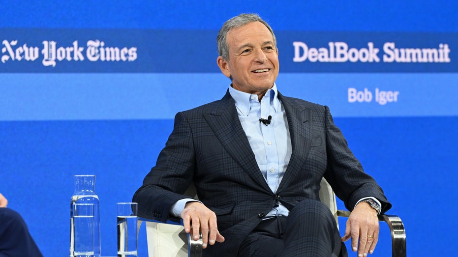 Bob Iger speaks on stage