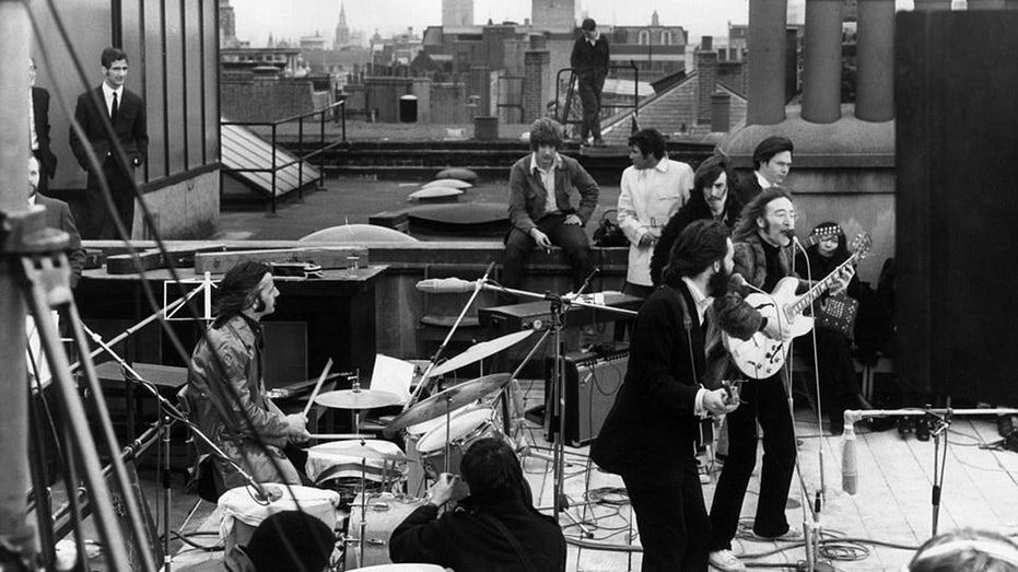 Beatles playing on the roof
