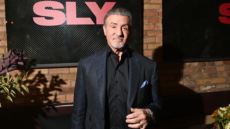 Sylvester Stallone posing on red carpet