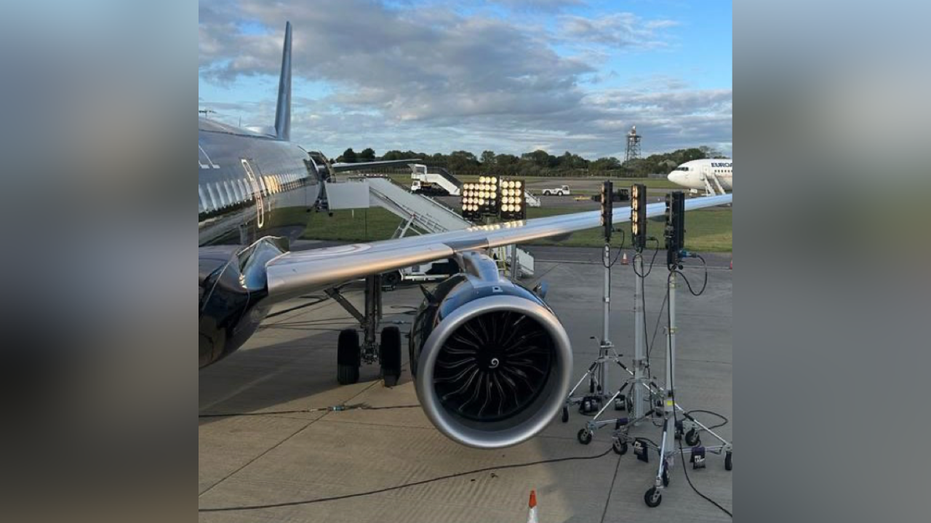 Bright lights seen on tarmac next to plane during filming session