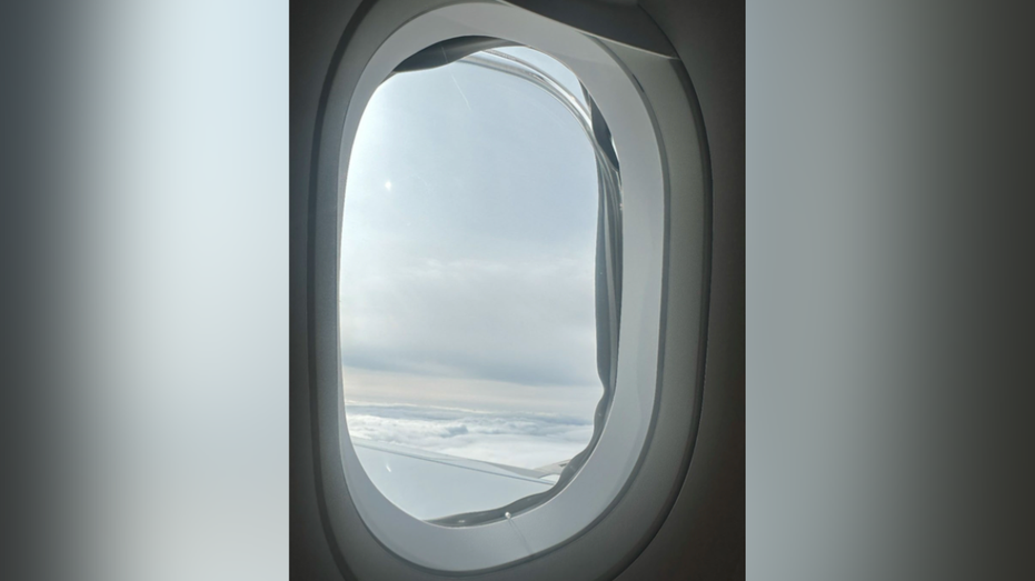 Window on plane seen protruding from original location.