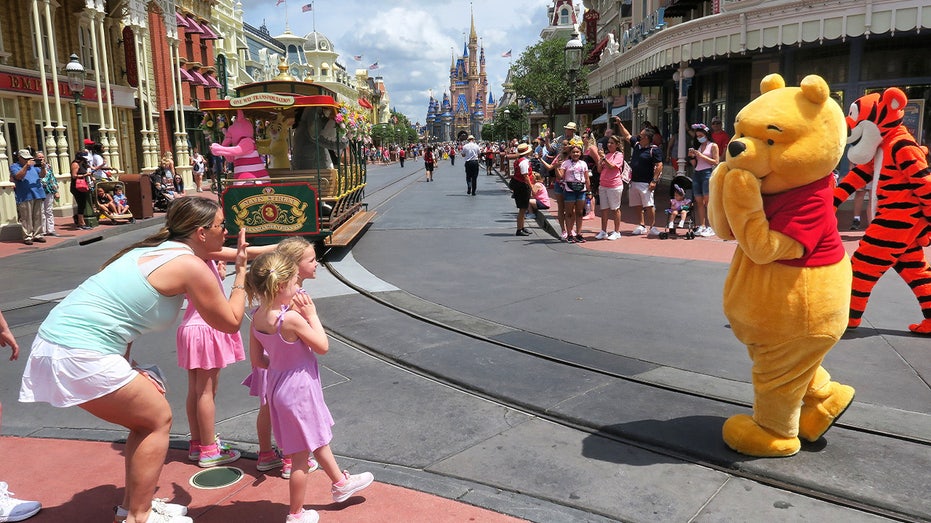 Kids with Winnie the Pooh and Tigger