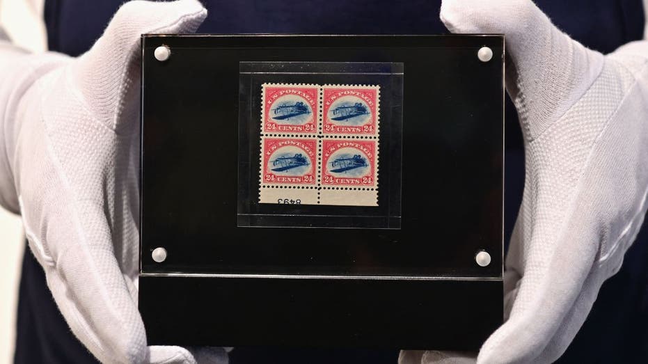stamps being held at an auction