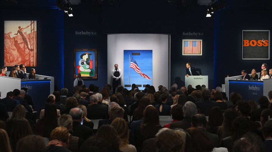 Bidders and attendees at the bidding process for a Picasso painting in Sotheby's New York