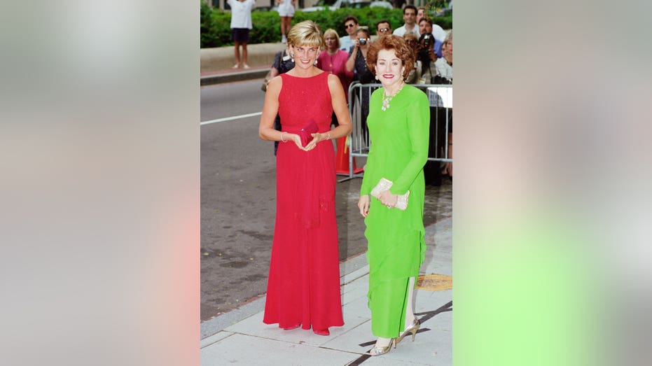 Princess Diana in a red dress with Elizabeth Dole