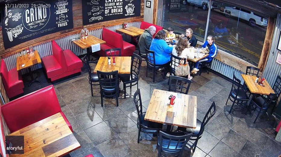 Friends enjoying dinner at the Grind