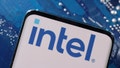A smartphone with a displayed Intel logo is placed on a computer motherboard in this illustration taken March 6, 2023. - Fox News