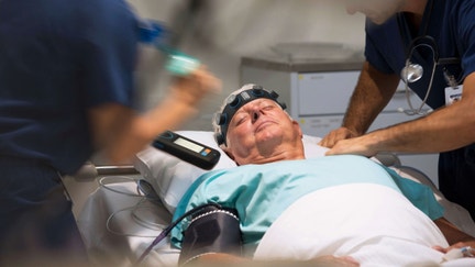 A patient wears a Ceribell device that is used to help doctors detect seizure activity.