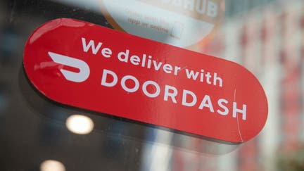 A restaurant displays a DoorDash logo in the Brooklyn borough of New York, US, on Saturday, Oct. 28, 2023. DoorDash Inc. is scheduled to release earnings figures on November 1. 