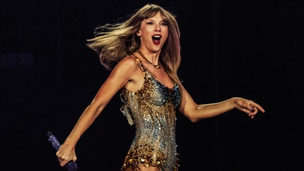 Taylor Swift performing during the Eras Tour. - Fox Business News