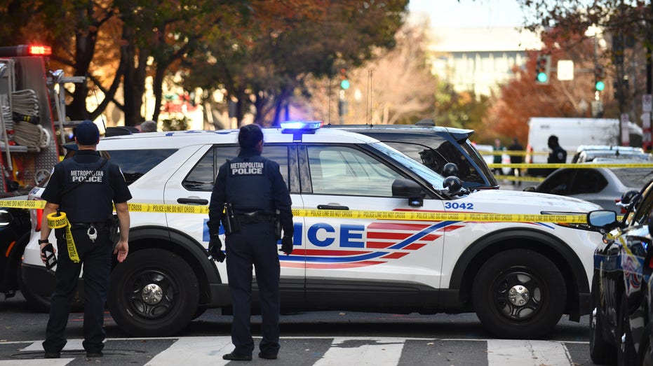 DC Police car with crime scene tape