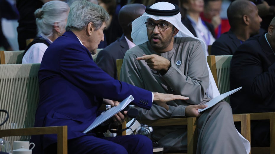 Sultan aj Jaber and John Kerry