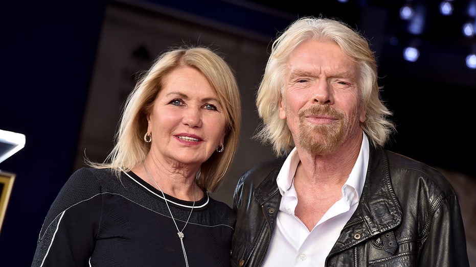 Joan Templeman and Richard Branson posing together