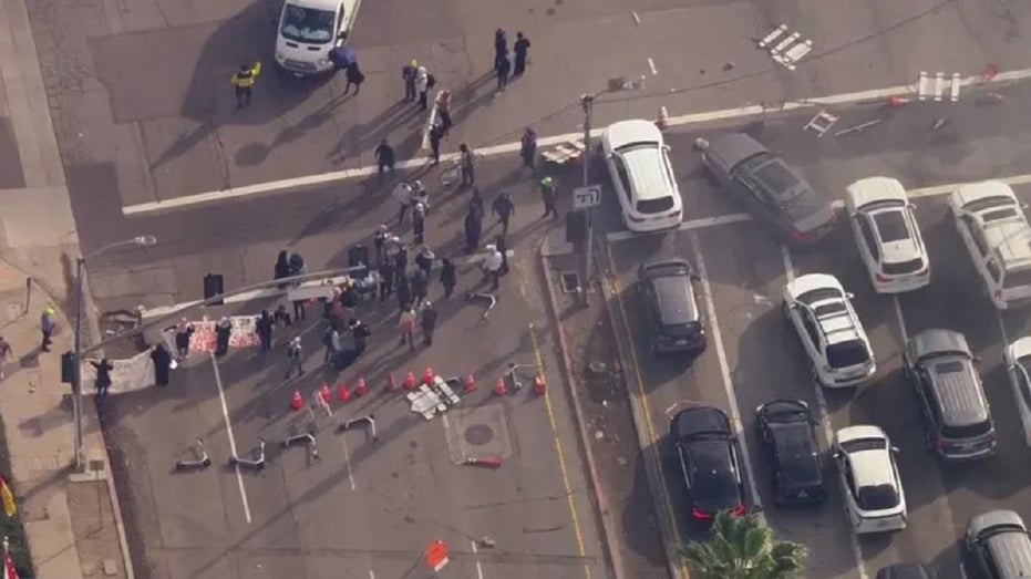 Protesters block a street in Los Angeles