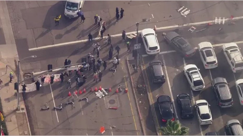 Protesters block a street in Los Angeles