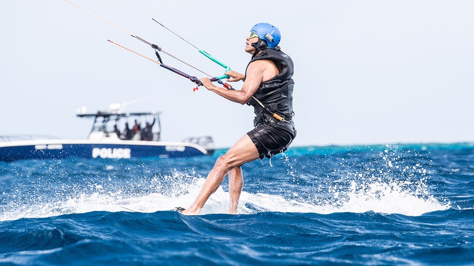 Former President Obama kite surfing