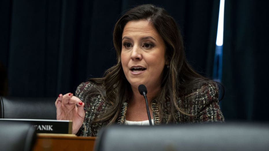 Elise Stefanik at microphone