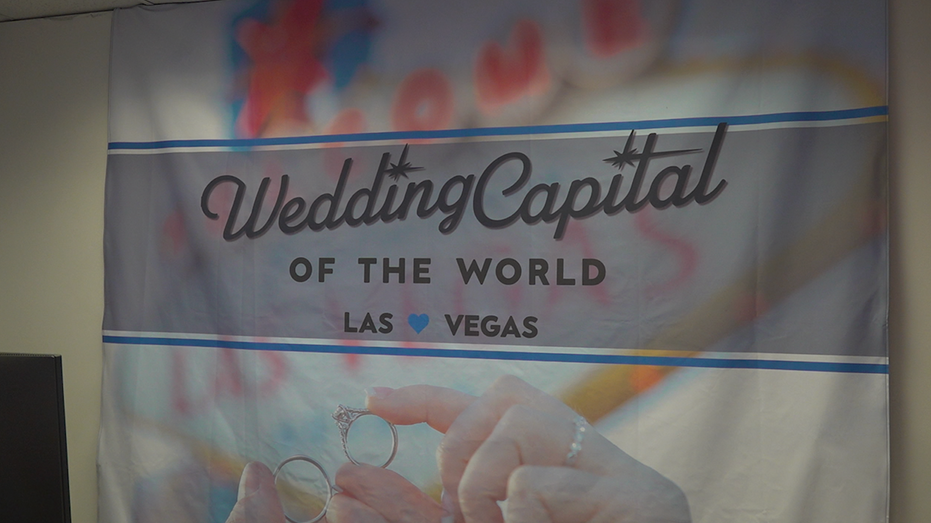 A sign that says Las Vegas is the wedding capital of the world