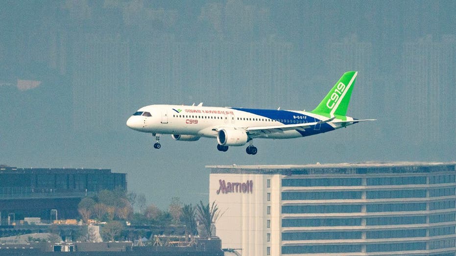 A Chinese made passenger jet lands in Hong KOng