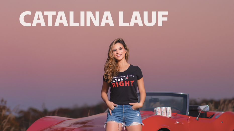 Catalina Lauf posing by red sports car