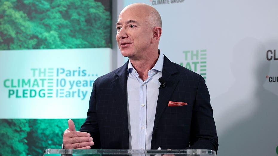 Jeff Bezos speaks at a podium