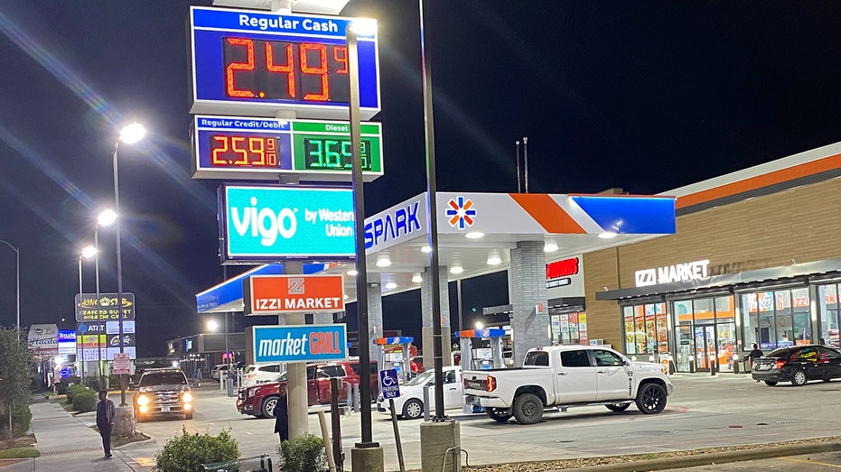 A gas station in Houston shows prices at $2.49 per gallon