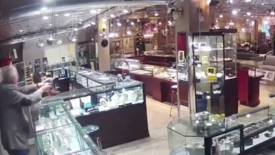 Armed jewelry store worker sends would-thieves running, stumbling in fear