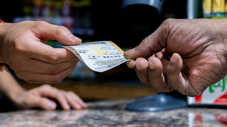 Powerball ticket getting sold