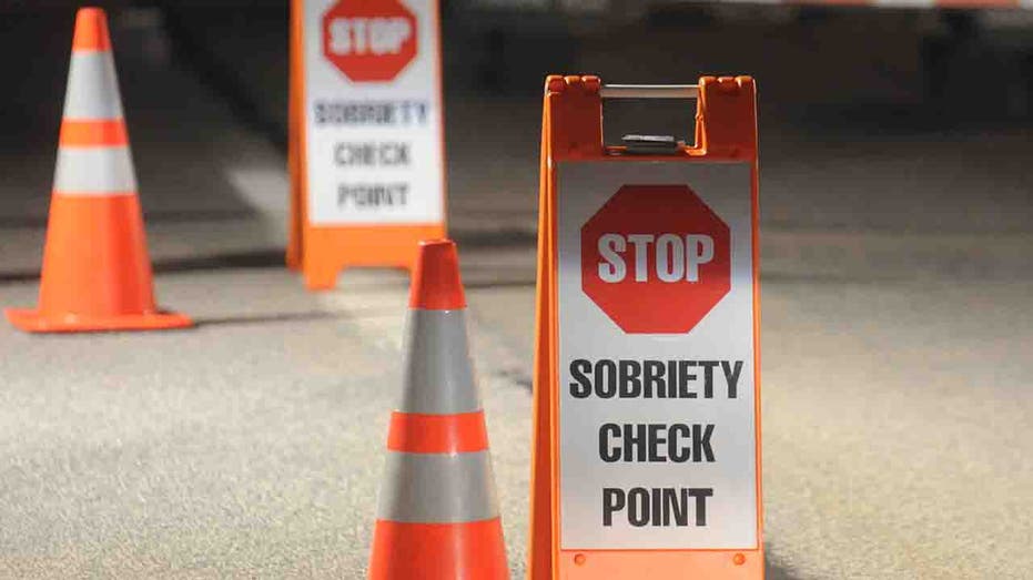 Sobriety Check Point signs in road