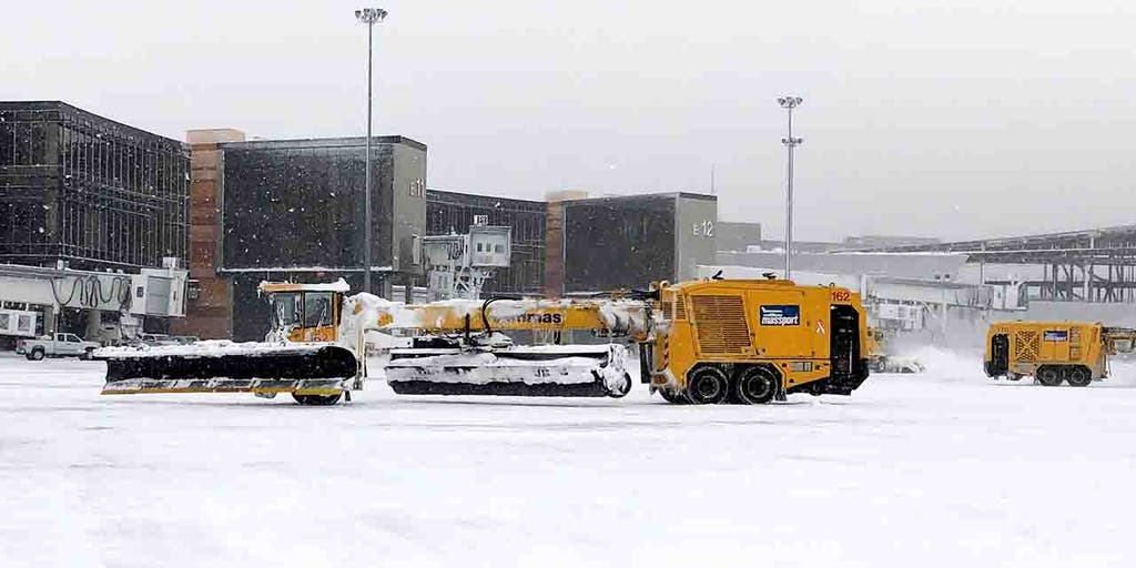 Massachusetts snowstorm cancels delays flights at Boston s Logan