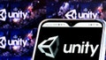In this photo illustration a Unity Software, Inc. logo is seen displayed on a smartphone screen.