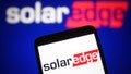 UKRAINE - 2021/07/04: In this photo illustration a SolarEdge Technologies logo is seen on a smartphone and a pc screen. (Photo Illustration by Pavlo Gonchar/SOPA Images/LightRocket via Getty Images)
