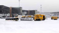 Massachusetts snowstorm cancels, delays flights at Boston's Logan Airport