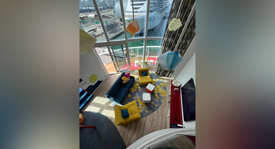 A seating area in the Ultimate Family Townhouse on the Icon of the Seas