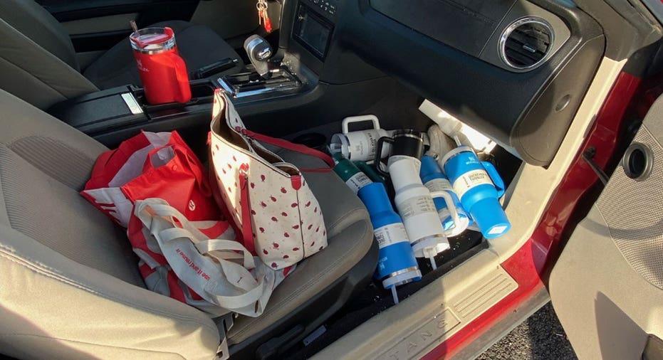 Stanley cups in bottom of car