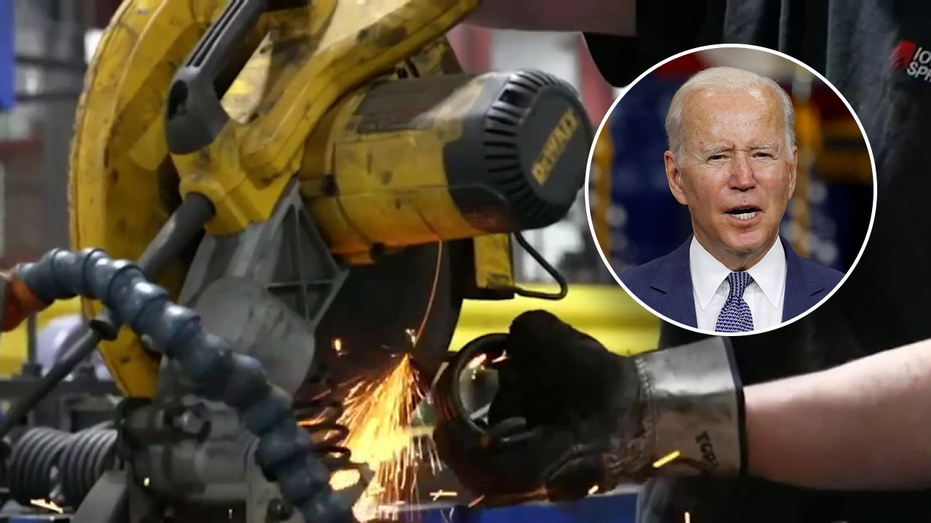 Biden in from of manufacturing worker