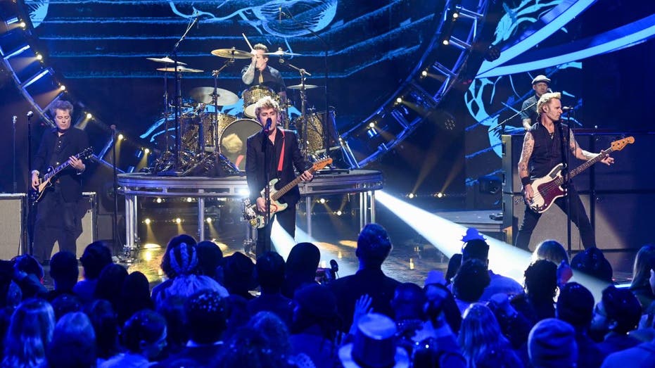 Green Day performing on stage