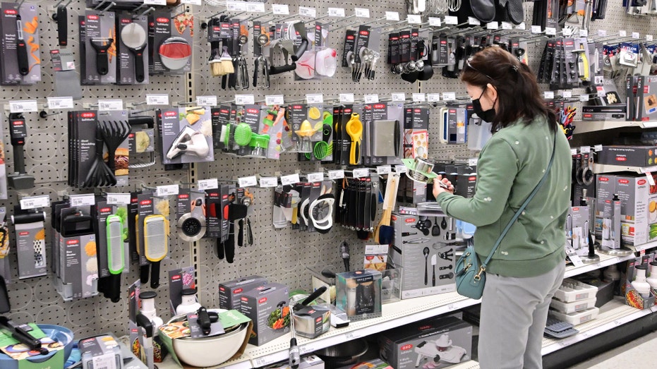 A woman shops at a retail store