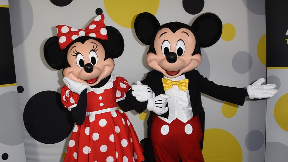 Mickey and Minnie Mouse posing together