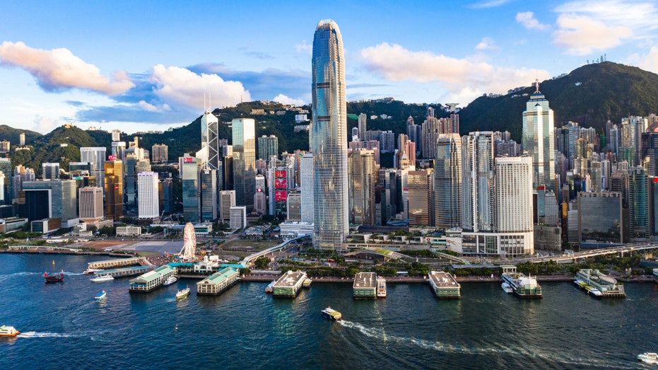 Hong Kong skyline seen in aerial shot above harbor