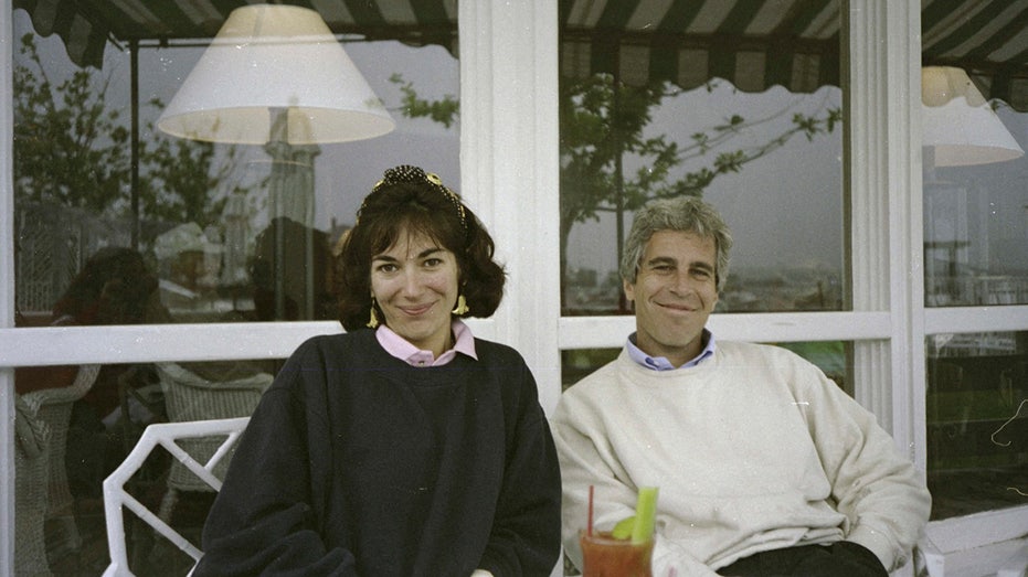 Ghislaine Maxwell and Jeffrey Epstein smile for a photo