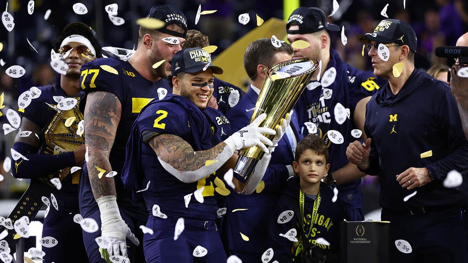 Blake Corum with national championship trophy