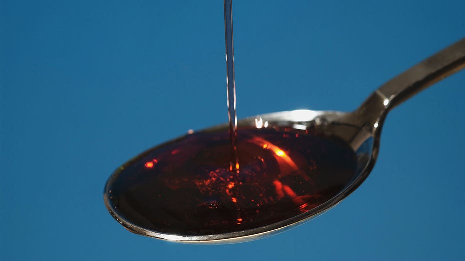 Cough syrup pouring