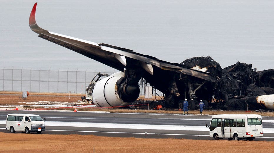 A ground view of the burnt remains of JAL Flight 516