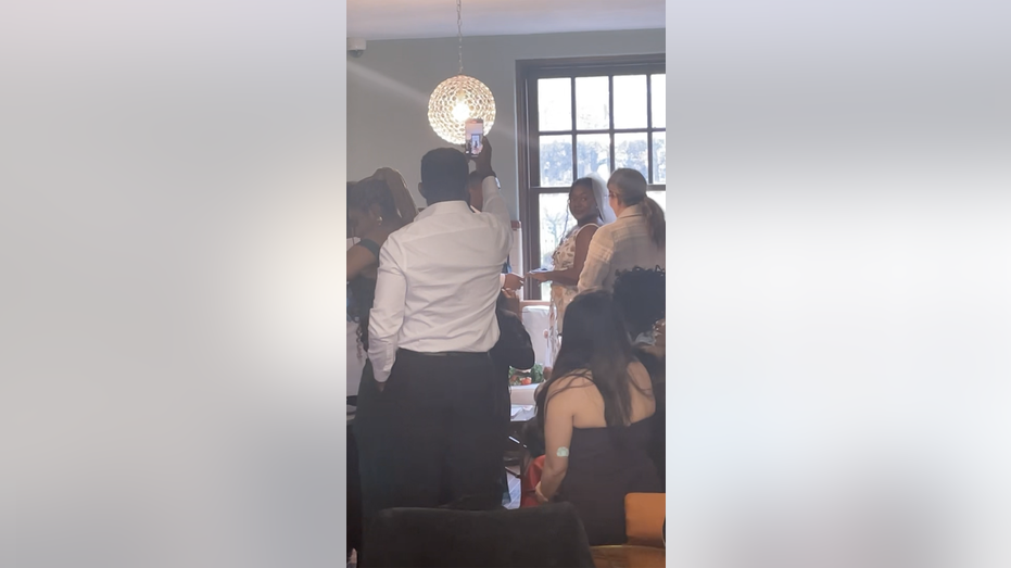 Bride and groom marry in coffee shop
