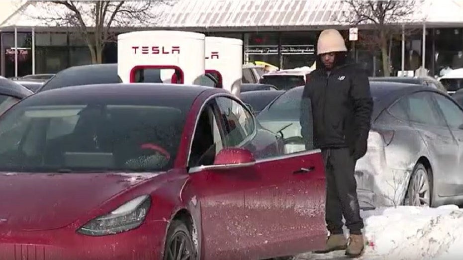 A visibly frustrated Tesla owner in a Chicago suburb
