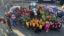 Matt Kaulig, owner of Kaulig Racing, poses with children during the Speediatrics Fun Day Festival