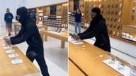 Masked California thief nabbed after being caught on video snatching dozens of iPhones from Apple Store