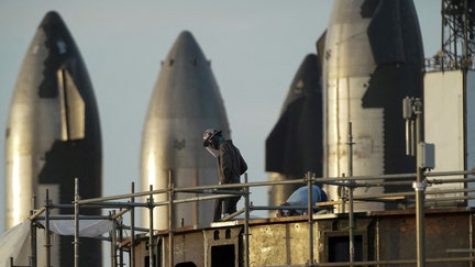 FILE PHOTO: People are seen working at the SpaceX Starbase in Brownsville, Texas, U.S., August 19, 2023. REUTERS/Veronica G. Cardenas/File Photo

 - Fox Business News